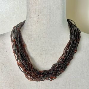 Brown multi-strand bead necklace